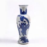 A Chinese blue and white porcelain baluster vase late 19th Century decorated with figure of a