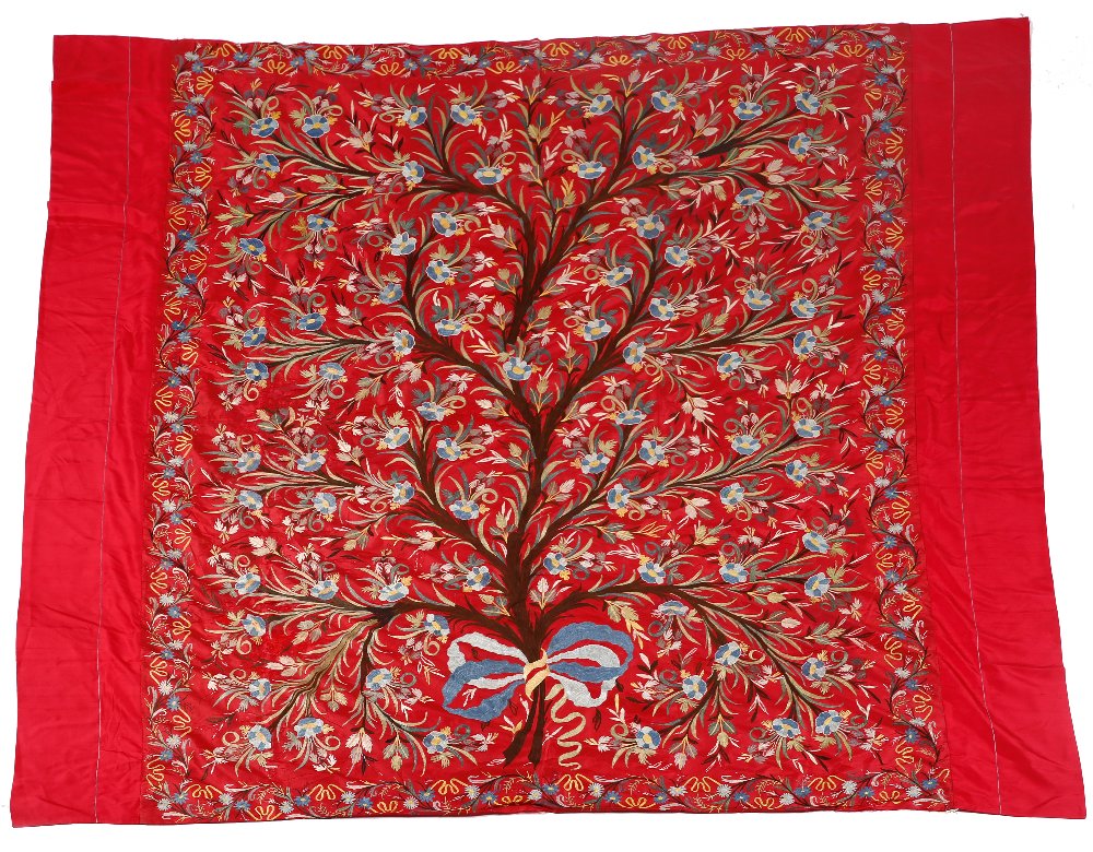 An Ottoman large red ground silk wall hanging/cover 19th Century embroidered with Tree of Life