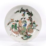 A Chinese famille verte porcelain charger 19th Century decorated with a longevity scene depicted