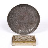 A Qajar tin on copper dish with engraved arabesques, 24cm and a Qajar brass rectangular box, 16.