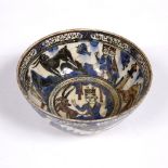 A Persian polychrome bowl 19th Century with lion figure and stag decoration within a Islamic text