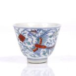 A Chinese Doucai miniature porcelain wine cup Qianlong of conical shape form decorated with two