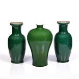A Chinese green monochrome vase 19th Century with Qianlong mark, 21cm and a pair of Chinese