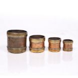 A set of four Indian Bombay 'Oriental' Seer measures 19th Century each brass and copper of graduated