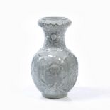 A Chinese clair de lune baluster vase 19th Century with panels of flowers and blossom and having a