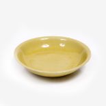 A Chinese Imperial yellow saucer dish Ming period foot with six character Jiajing (1522-1566) mark