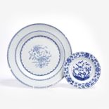 A Chinese blue and white plate 18th Century decorated with a central medallion of prunus, bamboo,