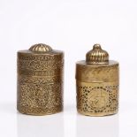 Two Qajar bronze betel nut pastel boxes each of cylindrical form with pierced and engraved