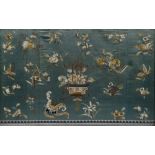 A Chinese pale blue silk panel 19th Century embroidered with a basket of flowers, butterflies and