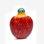 A Chinese 'imitation' realgor glass snuff bottle 1750-1850 of ovoid form and moulded within