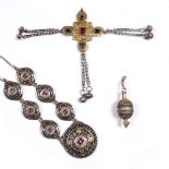 A collection of Middle Eastern silver metal jewellery to include a necklace made up of seven