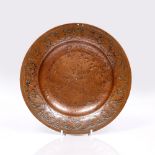 A Safavid copper dish 16th/17th Century with arabesque border and inscriptions to the underside of