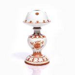 A Chinese porcelain wig or hat stand 19th Century formed as a baluster vase-shaped pedestal on