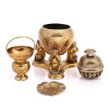 A group of Indian brass items to include a begging bowl a bell and other items