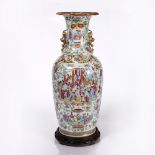 A Chinese Canton porcelain baluster vase circa 1870/80 painted with polychrome enamels with court