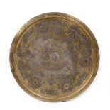 A Syrian Damascus brass and inlaid tray circa 1920/40 with bands of Islamic calligraphy, 65cm