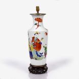 A Chinese polychrome baluster vase late 19th Century with Shou Lao and scholars, converted to a