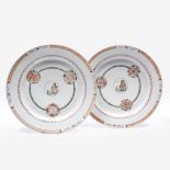 A pair of Chinese export porcelain chargers Qianlong (1736-1795) with famille rose decoration