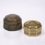 Two Mughal brass octagonal pan boxes one with engraved floral designs, the other with pierced and