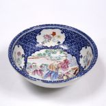 A Chinese export porcelain circular bowl Qianlong (1736-1795) the centre panel painted in famille