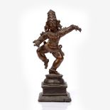 A Nayaka bronze figure of Balakrishna Indian, 19th Century on a plinth base, 18cm Provenance: From