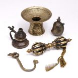 A collection of Indian and Tibetan bronze ware to include an engraved spittoon, flask in the form of