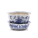 A Chinese partly gilded blue and white porcelain miniature four footed jardiniere Kangxi (1662-1722)