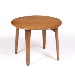 Gordon Russell Oak occasional table on tapering legs labelled 45.5cm high, 60.5cm diameter.