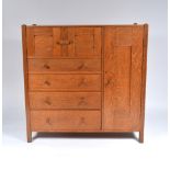 Heals 'Letchworth' oak compactum/nursery cupboard, circa 1910 cupboard and four drawers flanked by