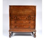 Heals Oak bureau, circa 1920 fall front, over five drawers with ebony handles raised on turned