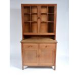 Heals Oak dresser, circa 1920 in unpolished finish, top section with plate racks enclosed by