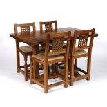 Colin 'Beaverman' Almack Oak refectory dining table and four chairs table with adzed top on two