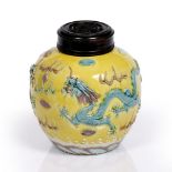 A Chinese ginger jar Daoguang period of rounded form, decorated in high relief with turquoise and