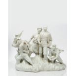 A Chinese group of figures with Mao Zedong 1934/1935 standing on a plinth formed by grass and four