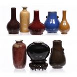 A Chinese group of miniature porcelain vases 18th/19th Century a compressed rounded jar shaped