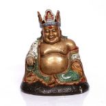 A Chinese Canton seated Put-tai late 19th Century with gilded body wearing a crown and seated on