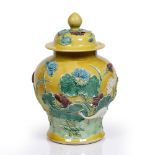 A Chinese porcelain inverted baluster vase and cover 19th Century decorated with white, blue and