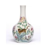 A Chinese porcelain bottle vase late 19th Century decorated in famille rose palette with a pie-