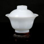 A Beijing opaline white glass bowl and cover 19th Century 11cm Provenance: Bought in the first