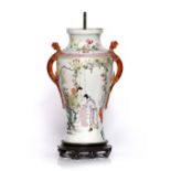 A Chinese famille rose vase 19th Century with garden scenes and serpent handles converted to a table