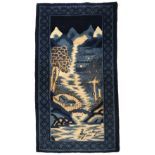 A Chinese pictorial rug depicting a mountain village within a border, blue ground, 170cm x 92cm