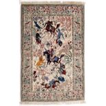 An Isfahan Persian white ground rug decorated with hunting scenes, 150cm x 100cm