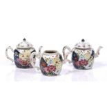 A set of three graduated famille rose 'tobacco-leaf' teapots Qianlong (1736-1795) painted in the