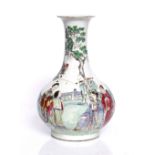 A Chinese porcelain bottle vase Daoguang enamelled with musicians, scholars and ladies on a terrace,