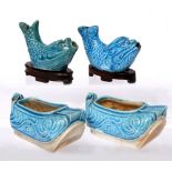 A pair of Chinese turquoise water droppers Kangxi (1662-1722) of fish form, on hardwood stands 9cm