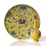 A Chinese famille jaune shallow dish 19th Century allover peony and scrolling leaves, 28.5cm