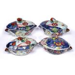 A pair of Chinese famille rose 'tobacco-leaf' oval tureen and covers Qianlong (1736-1795) with