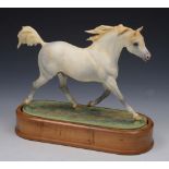 A ROYAL WORCESTER MODEL of an Arab Stallion by Doris Lindner 1963 numbered 1309F, 26.5cm lg on