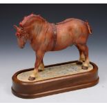 A ROYAL WORCESTER MODEL of a Suffolk Stallion by Doris Lindner 1969 numbered 592, 25cm lg on