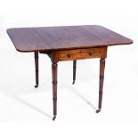 A GEORGE IV ROSEWOOD PEMBROKE TABLE on ring turned legs and brass castors, 92cm w x 84cm d x 72cm d